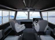 Spacious cabin interior with oversized console for flush mount electronics
